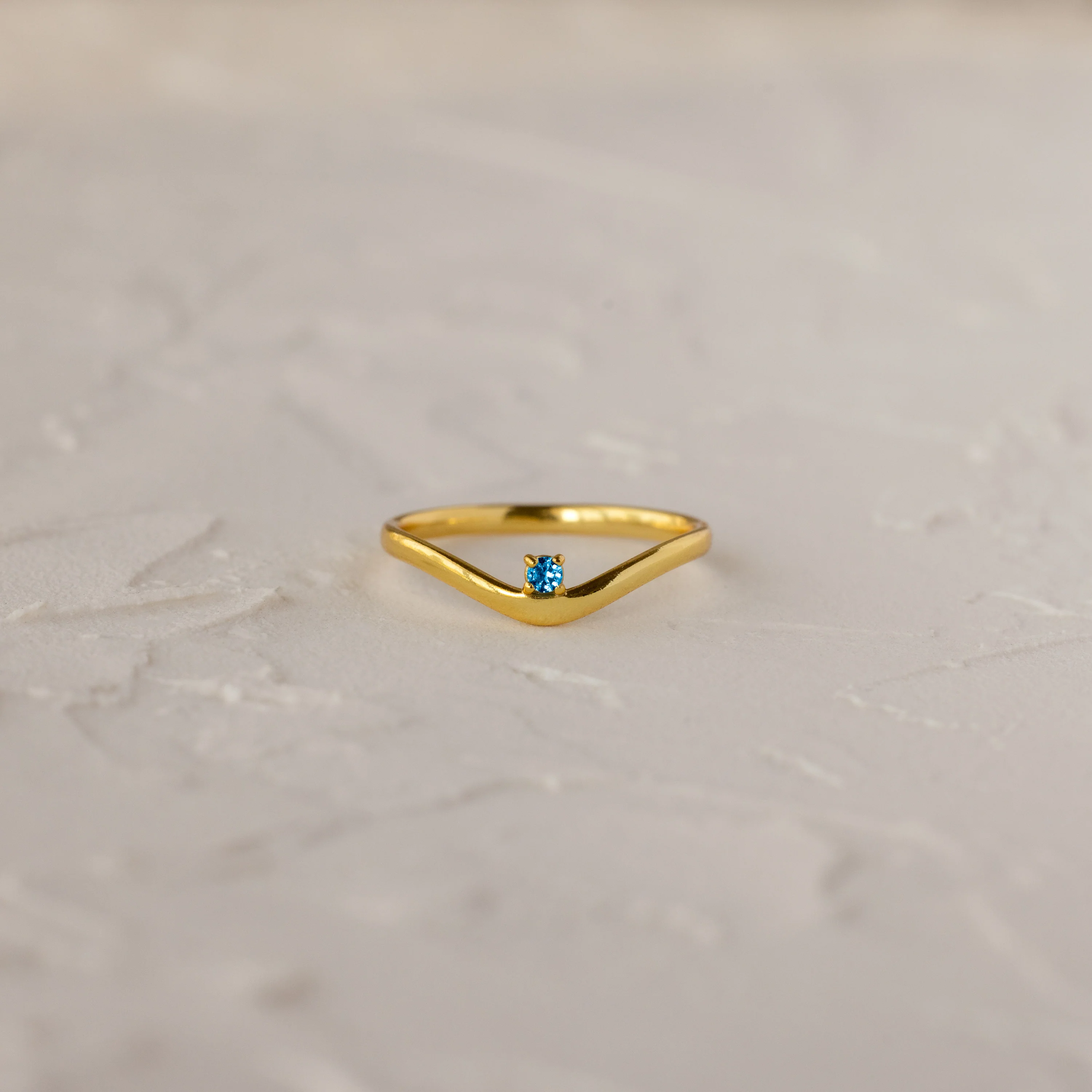 Blue Zircon Drop Curve Ring