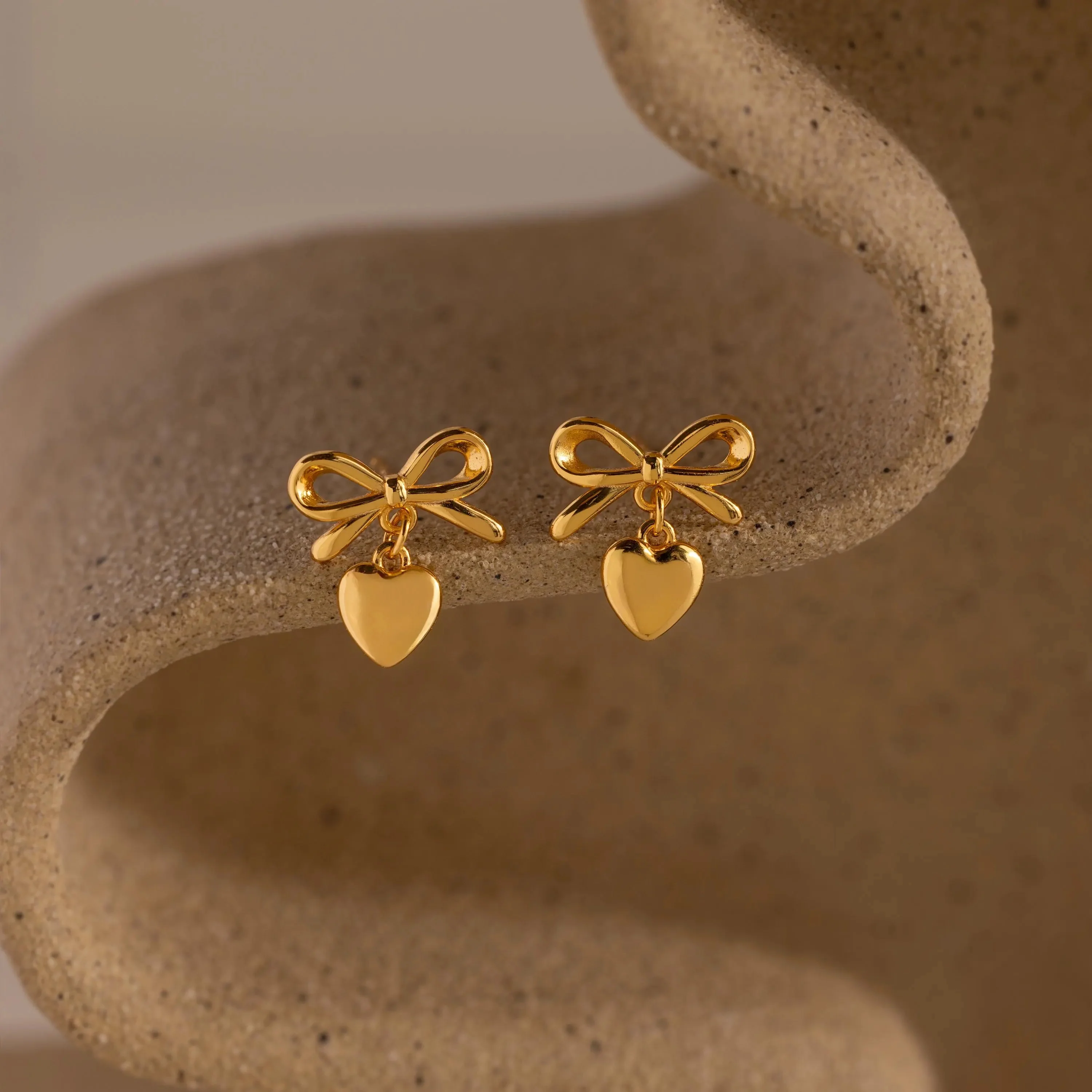 Bow Heart Studs in 18K Gold